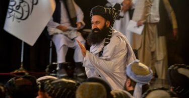 Afghanistan's minister for refugees, Khalil Haqqani at a gathering held to mark the first anniversary of their return to power in Afghanistan in Kabul on August 15, 2022. (AFP)