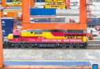 A drone photo shows a cargo train before departure at the Tuanjiecun Station in Chongqing, southwest China, Feb. 10, 2025. A freight train loaded with 55 forty-foot equivalent unit containers left Chongqing on Monday for Afghanistan's port city of Hairatan, marking the first trip of the direct freight train service between two cities. (Xinhua/Tang Yi)