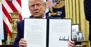 POTUS Donald Trump holds an executive order on increasing tariffs, in the Oval Office of the White House in Washington, US, on February 13, 2025. KEVIN LAMARQUE / REUTERS