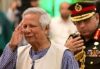 Muhammad Yunus with General Waker-uz-Zaman | AFP