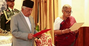 Nepal's President Ram Chandra Paudel administers the oath to the country's newly appointed Prime Minister Sushila Karki during her swearing-in-ceremony at the President House in Kathmandu on September 12, 2025. (AFP)