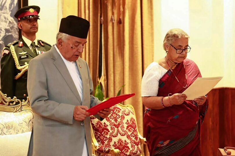 Nepal's President Ram Chandra Paudel administers the oath to the country's newly appointed Prime Minister Sushila Karki during her swearing-in-ceremony at the President House in Kathmandu on September 12, 2025. (AFP)