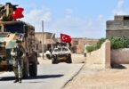 Turkish soldiers accompanied by armoured vehicles patrolling between the city of Manbij in northern Syria and an area it controls after a 2016-2017 military incursion on June 18, 2018. Turkey said it had started military patrols in an area around the Kurdish-held city of Manbij, in line with an agreement with the United States to scale down tensions in the region. / AFP PHOTO / AFP PHOTO AND TURKISH ARMED FORCES / Handout